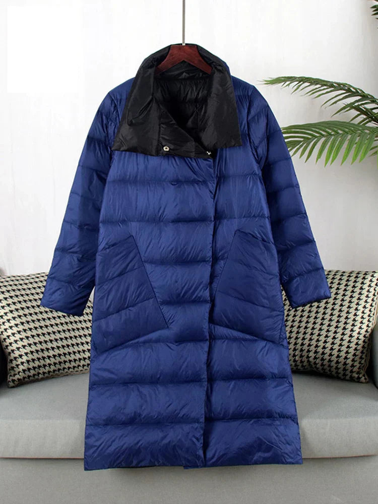"Elegante Nordiva winterjas met geruit patroon, wolmix, vooraanzicht. Perfecte warmte en stijl voor koud weer."