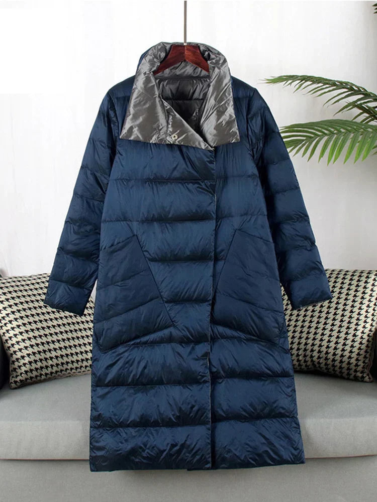 "Elegante Nordiva winterjas met geruit patroon, wolmix, vooraanzicht. Perfecte warmte en stijl voor koud weer."
