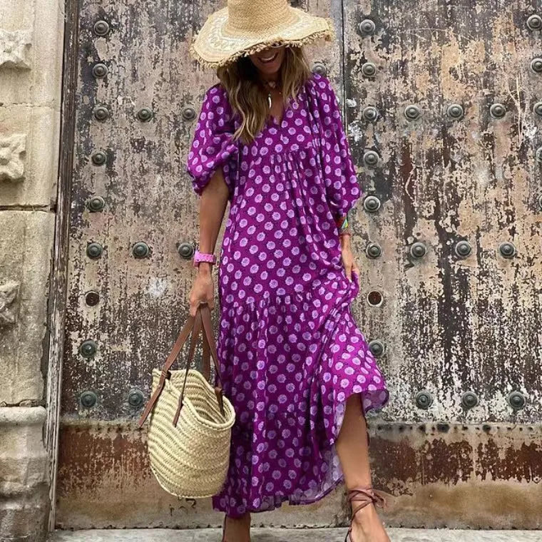"Elegante Paris zomerjurk, midi lengte met frisse patronen, knoopdetails en luchtige mouwen voor zomerse dagen."