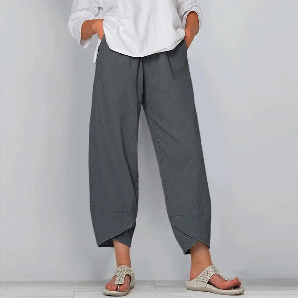 "Elegante Silvia Linnen Broek met relaxte pasvorm, elastische taille en zijzakken, perfect voor casual en comfort."