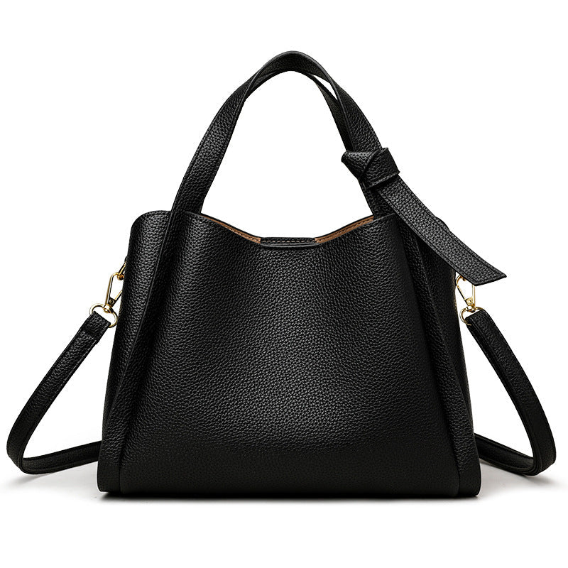 Elegante vegan schoudertas voor dames, gemaakt van duurzaam vegan leer, verkrijgbaar in bruin, groen en zwart.