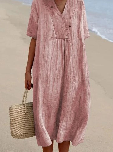 Elegante zomerse midi jurk in zachte katoenmix met V-hals en korte mouwen, perfect voor diverse gelegenheden.
