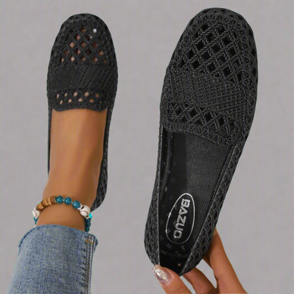 "Elegante zwarte damesschoenen mocassins, ademend en comfortabel, geschikt voor elke gelegenheid, modern design."