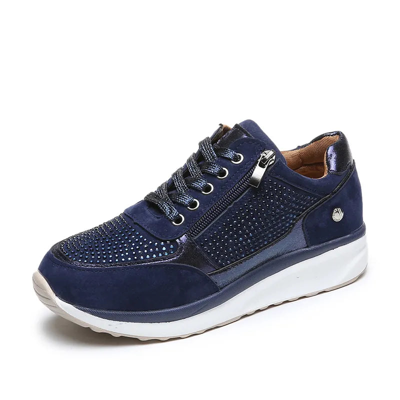 "Ergonomische damessneakers in grijs met ademende materialen, bieden stijl en comfort voor dagelijks gebruik."