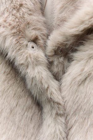 "Fluffy damesmantel winterjas, warm, stijlvol met chique pasvorm en lange mouwen, perfect voor koude dagen"