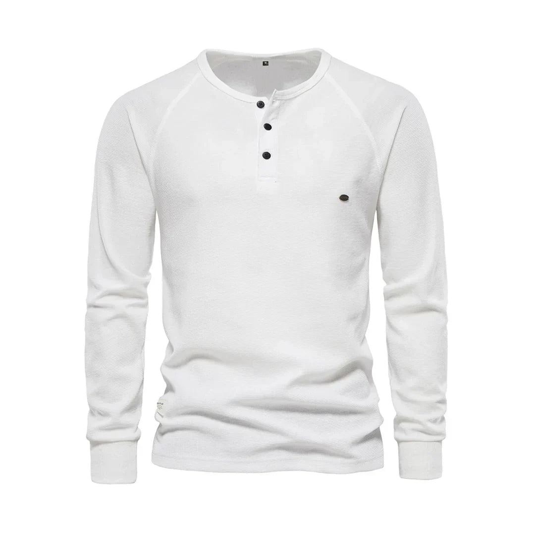 "Heren langemouwenshirt met ronde hals en knoopsluiting, beschikbaar in marineblauw, groen, lichtgrijs en wit."
