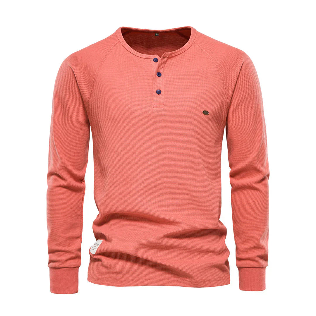 "Heren langemouwenshirt met ronde hals en knoopsluiting, beschikbaar in marineblauw, groen, lichtgrijs en wit."