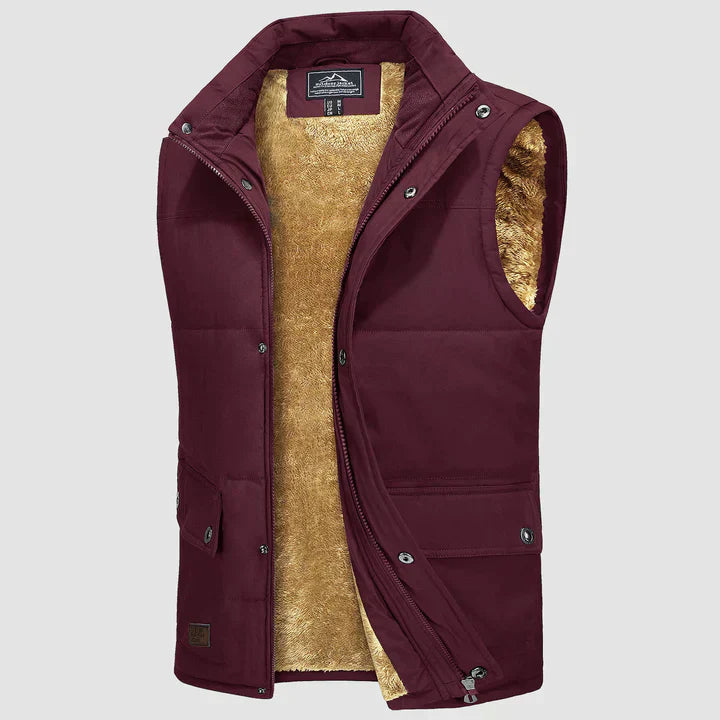 "Herfstige bodywarmer voor heren met meerdere zakken, ideale combinatie van functionaliteit en stijl voor buitenactiviteiten.
