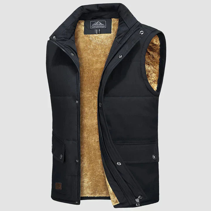 "Herfstige bodywarmer voor heren met meerdere zakken, ideale combinatie van functionaliteit en stijl voor buitenactiviteiten.