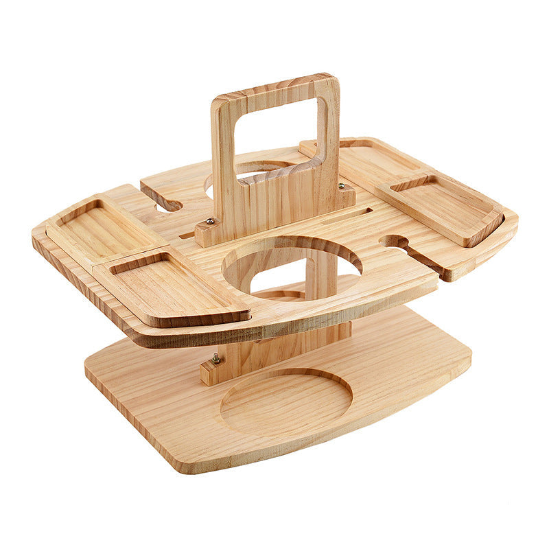 Houten draagbare picknickwijntafel met wijngleuven en ruime serveervakken voor snacks en wijn, ideaal voor buitengebruik.