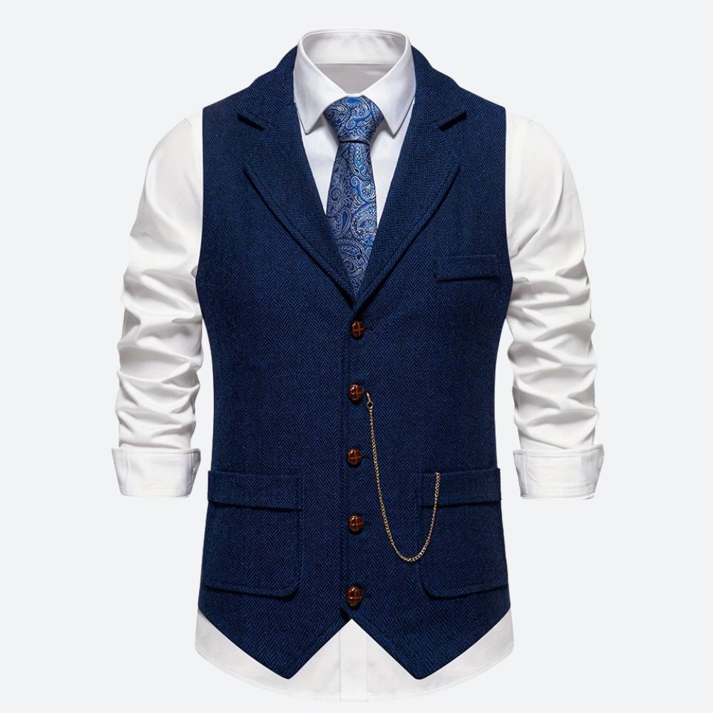 "Klassiek herengilet met visgraatmotief, stijlvol en tijdloos, ideaal voor formele en zakelijke gelegenheden."