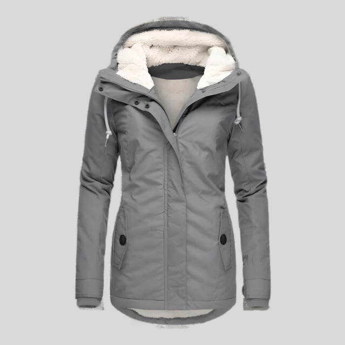 "Lange winterjas, waterdicht, met capuchon en zachte voering voor dames, biedt style en bescherming voor koud weer."