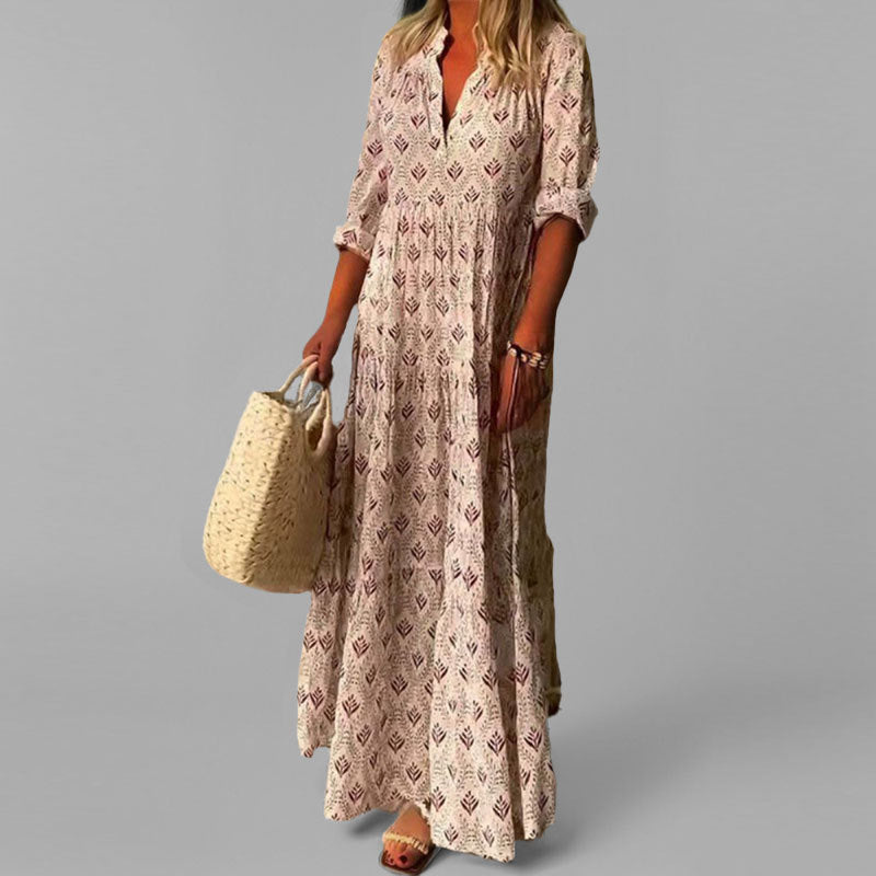 "Lichte katoenen maxi jurk met V-hals, 3/4 mouwen en vintage print voor dames, ideaal voor zomerse elegantie."