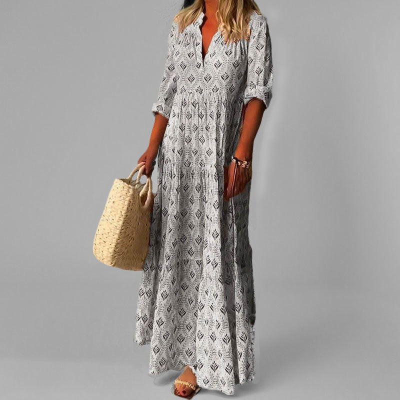 "Lichte katoenen maxi jurk met V-hals, 3/4 mouwen en vintage print voor dames, ideaal voor zomerse elegantie."