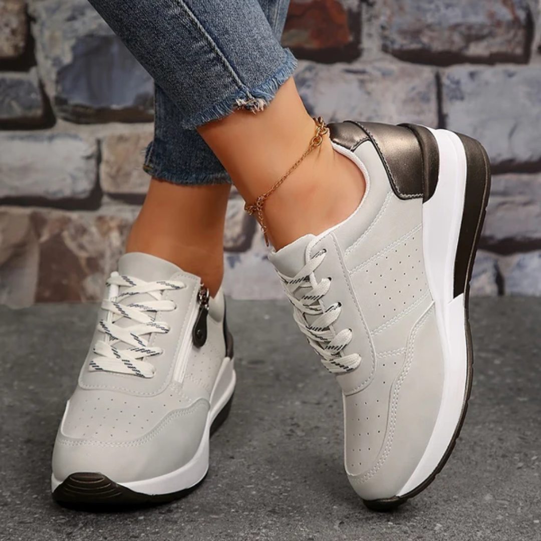 "Lichtgewicht orthopedische dames sneakers met zijrits, beige kleur, comfortabele gedempte zool, modern design."