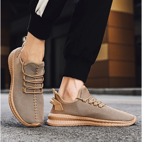 "Lichtgewicht orthopedische herenschoenen in zwart, ergonomisch ontwerp met ademend mesh, ideaal voor dagelijks comfort."