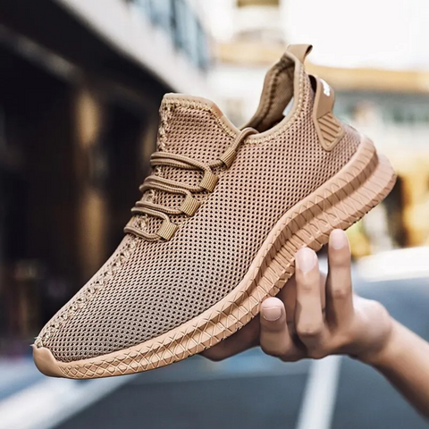 "Lichtgewicht orthopedische herenschoenen in zwart, ergonomisch ontwerp met ademend mesh, ideaal voor dagelijks comfort."