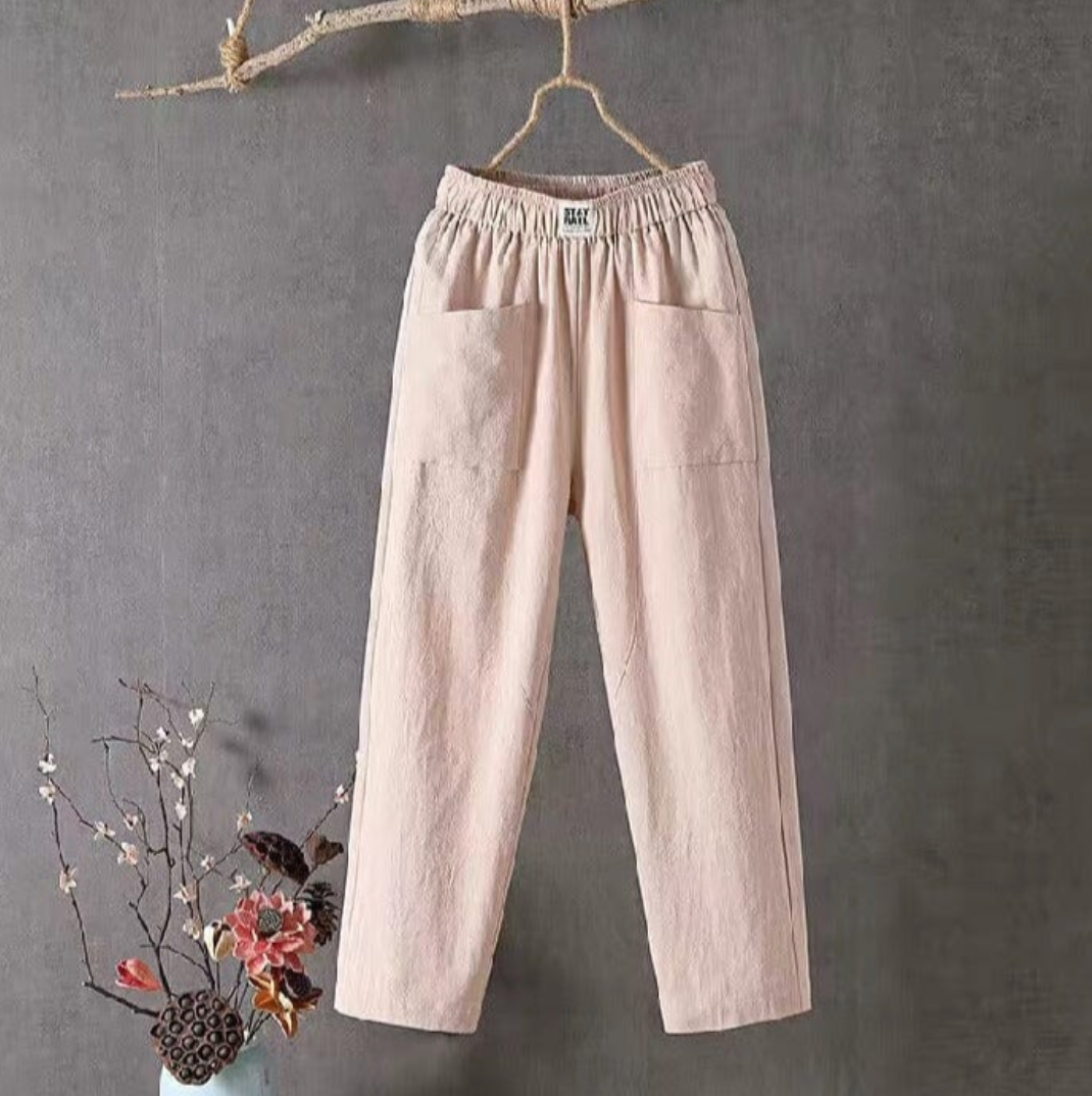 Linnen broek elegante stof en elastische taille, ideaal voor zomerse dagen, biedt comfort en een stijlvolle pasvorm.