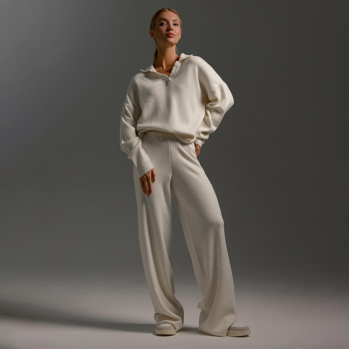 Lounge set voor dames met oversized polosweater en brede broek, zachte ademende stof, ideaal voor stijlvol comfort thuis.