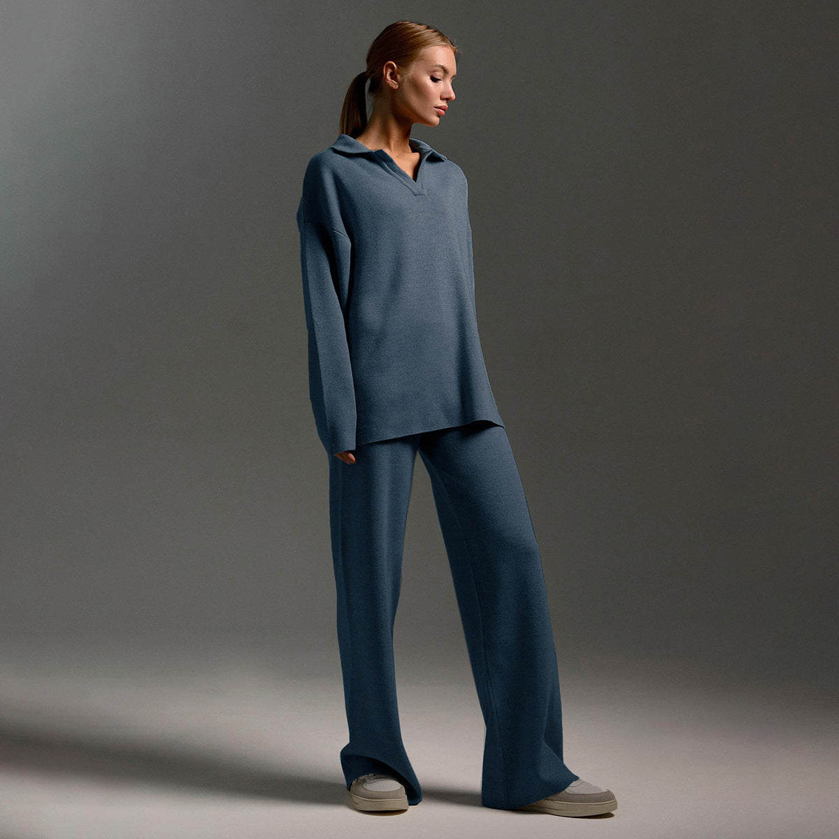 Lounge set voor dames met oversized polosweater en brede broek, zachte ademende stof, ideaal voor stijlvol comfort thuis.