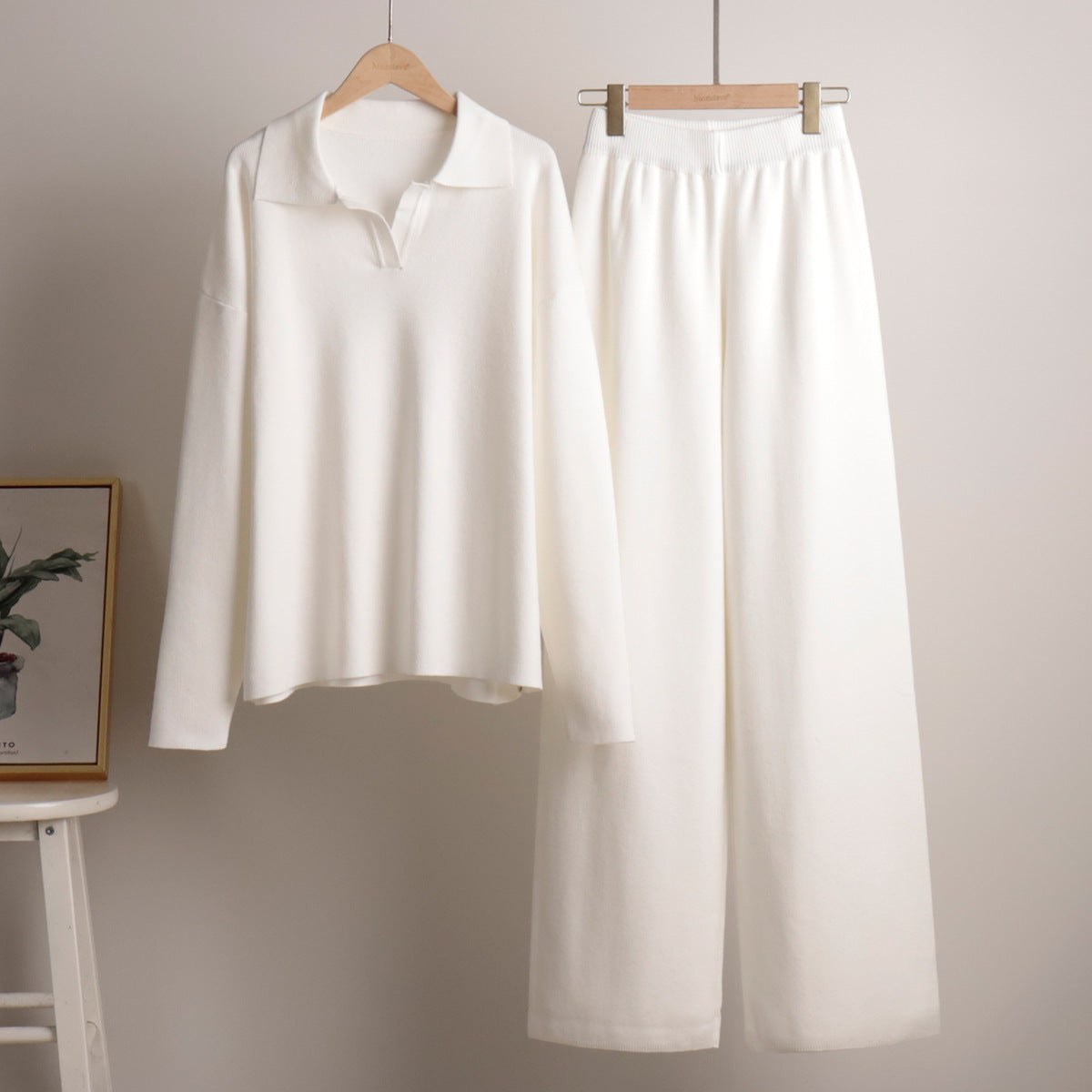Lounge set voor dames met oversized polosweater en brede broek, zachte ademende stof, ideaal voor stijlvol comfort thuis.