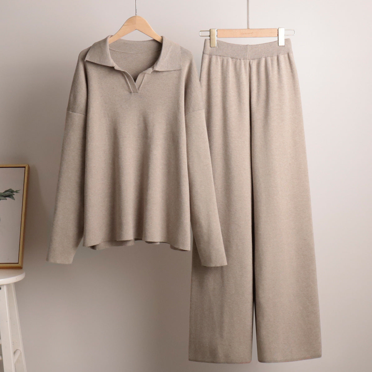 Lounge set voor dames met oversized polosweater en brede broek, zachte ademende stof, ideaal voor stijlvol comfort thuis.