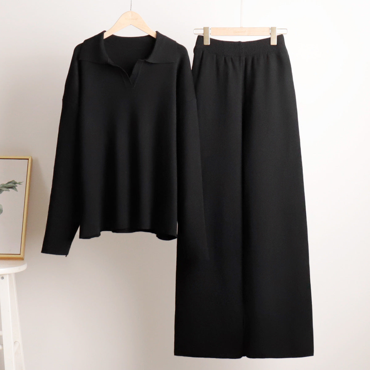 Lounge set voor dames met oversized polosweater en brede broek, zachte ademende stof, ideaal voor stijlvol comfort thuis.