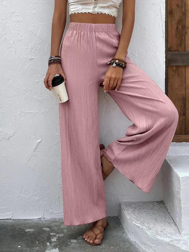 "Luchtige boho-stijl dames palazzo broek met wijde pijpen en elastische tailleband, ideaal voor zomer en casual looks."