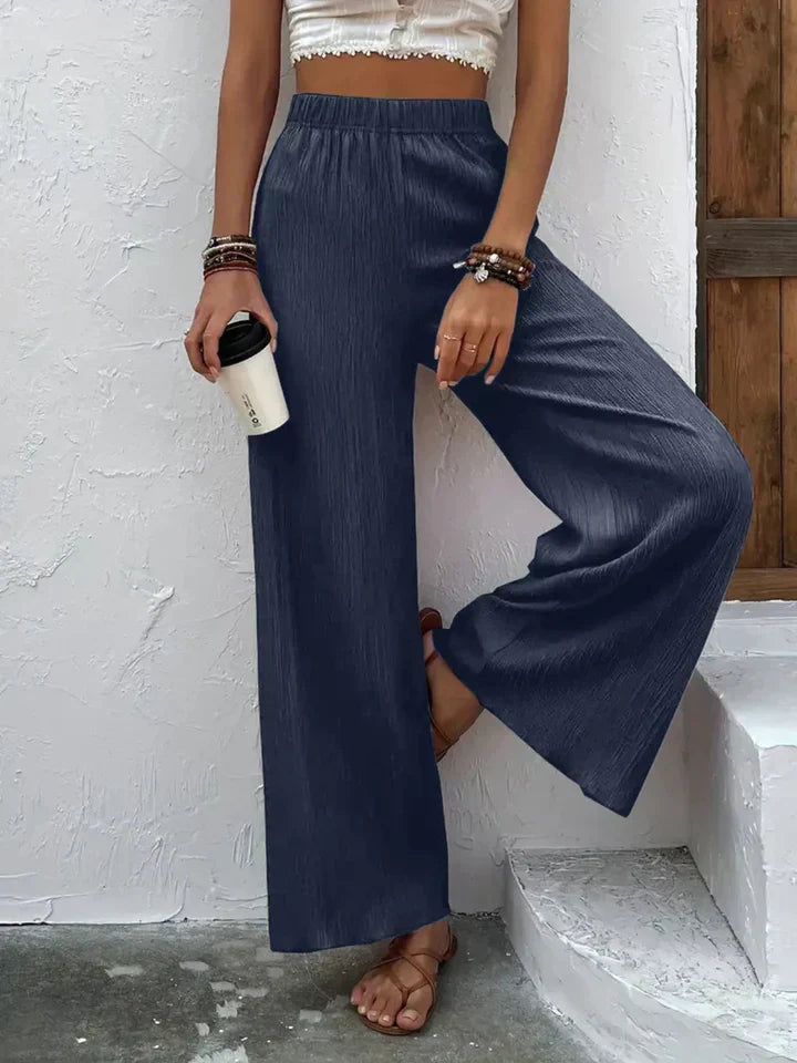 "Luchtige boho-stijl dames palazzo broek met wijde pijpen en elastische tailleband, ideaal voor zomer en casual looks."
