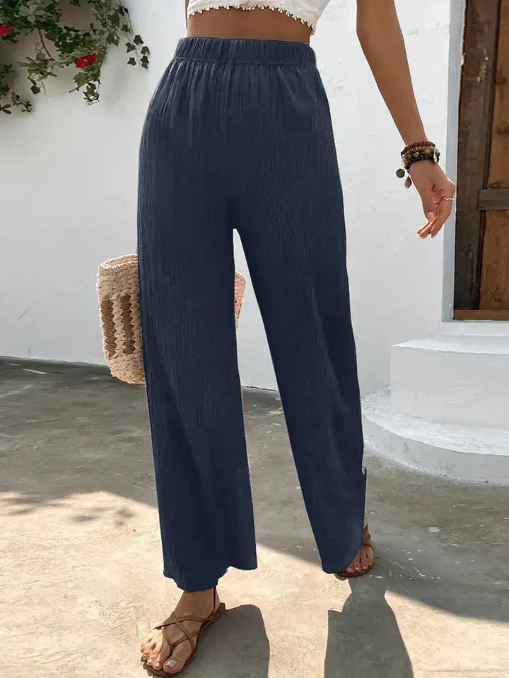 "Luchtige boho-stijl dames palazzo broek met wijde pijpen en elastische tailleband, ideaal voor zomer en casual looks."