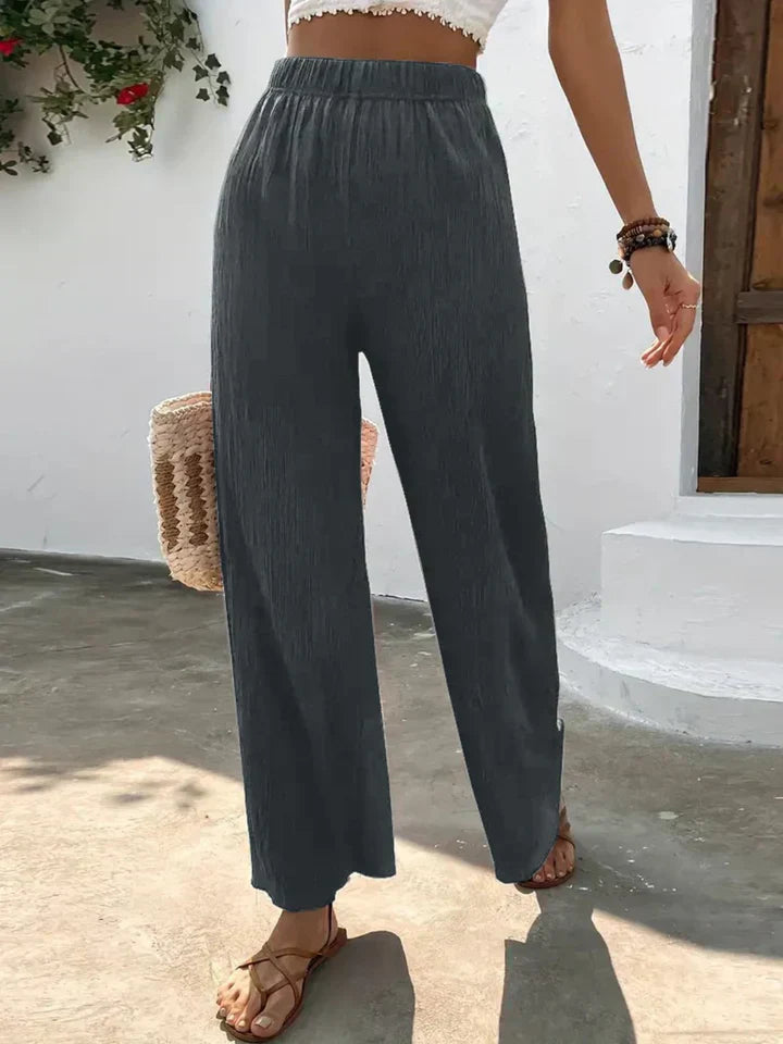"Luchtige boho-stijl dames palazzo broek met wijde pijpen en elastische tailleband, ideaal voor zomer en casual looks."