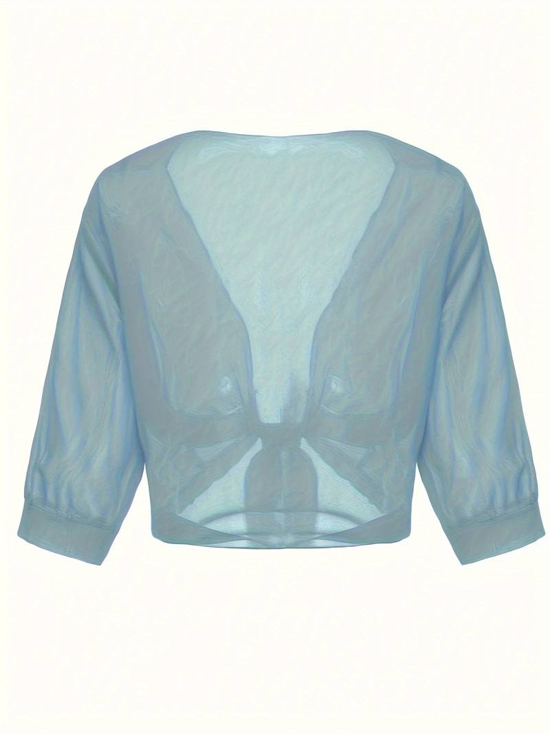 "Luchtige elegante damesblouse met open voorkant, frisse charmante look, perfect voor zonnige dagen."