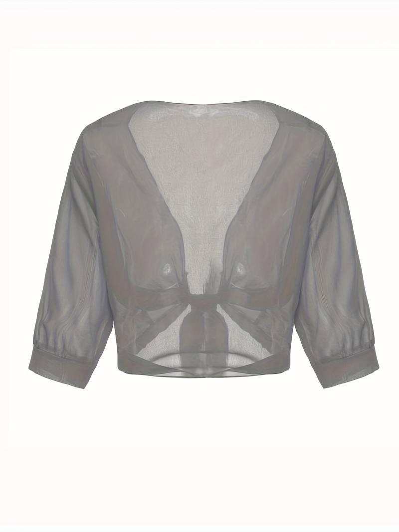 "Luchtige elegante damesblouse met open voorkant, frisse charmante look, perfect voor zonnige dagen."