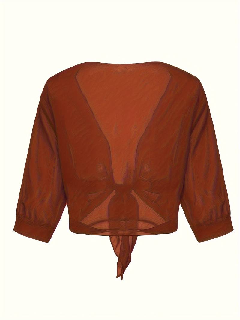 "Luchtige elegante damesblouse met open voorkant, frisse charmante look, perfect voor zonnige dagen."