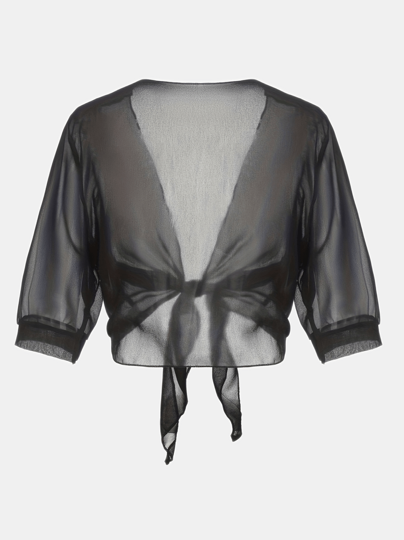 "Luchtige elegante damesblouse met open voorkant, frisse charmante look, perfect voor zonnige dagen."