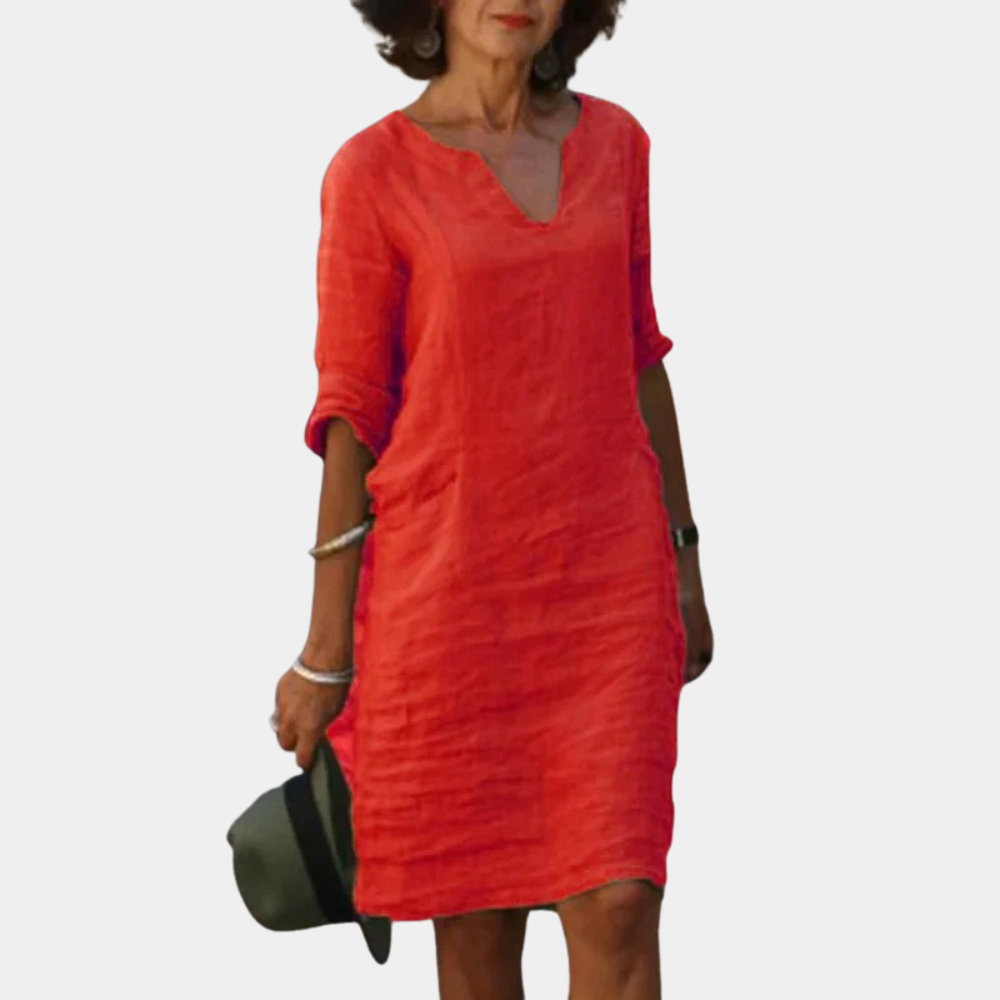"Luchtige gele zomerjurk voor dames met verfijnde details, ideaal voor zonnige dagen en comfortabel strandwandelingen."