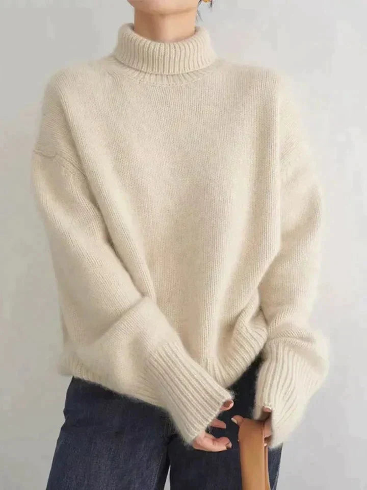 "Luxe beige kasjmier coltrui voor dames, warme en stijlvolle trui, tijdloos ontwerp, lichte en zachte stoffen."