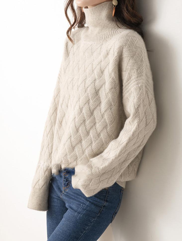 Luxe kasjmiertrui voor dames, crème kleur, zachte textuur, elegante en tijdloze stijl, geschikt voor elke gelegenheid.