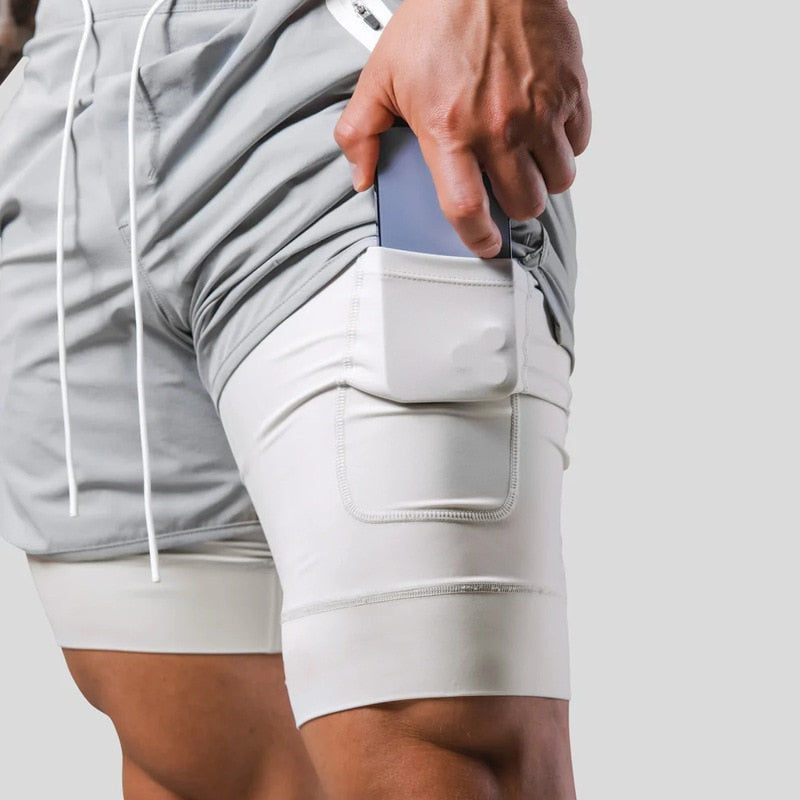 "Mauro 2-in-1 sportbroek heren, zwart, shorts met ingebouwde compressielegging, functionele zakken, elastische tailleband."