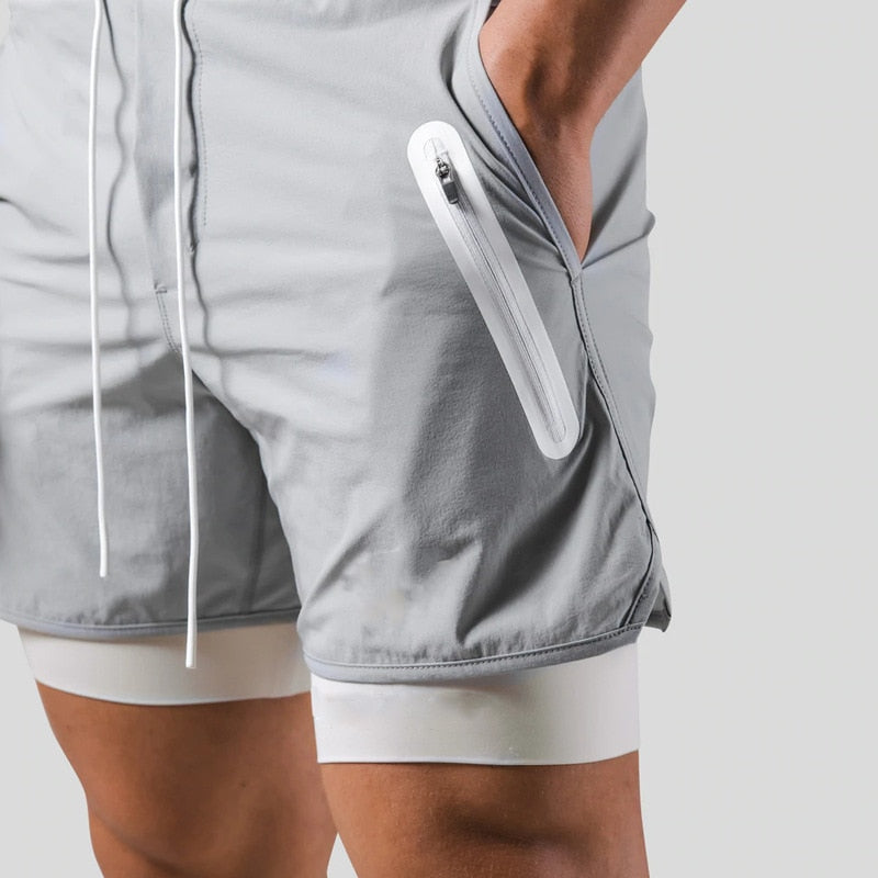"Mauro 2-in-1 sportbroek heren, zwart, shorts met ingebouwde compressielegging, functionele zakken, elastische tailleband."