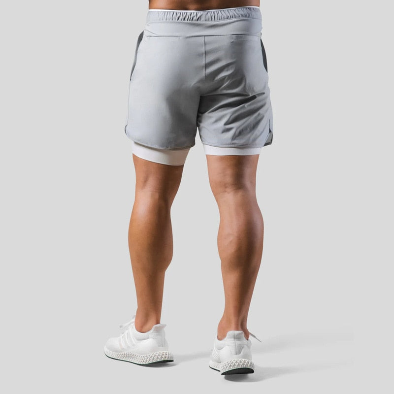 "Mauro 2-in-1 sportbroek heren, zwart, shorts met ingebouwde compressielegging, functionele zakken, elastische tailleband."