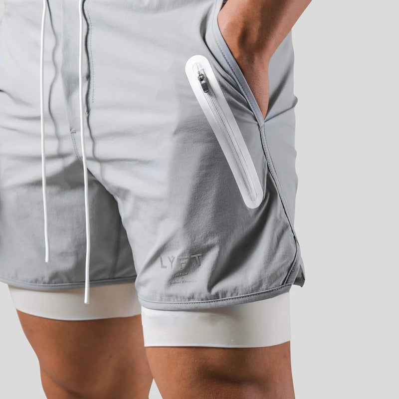 "Mauro 2-in-1 sportbroek heren, zwart, shorts met ingebouwde compressielegging, functionele zakken, elastische tailleband."