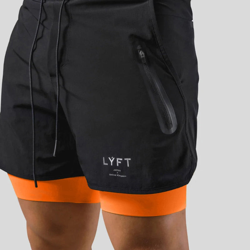 "Mauro 2-in-1 sportbroek heren, zwart, shorts met ingebouwde compressielegging, functionele zakken, elastische tailleband."