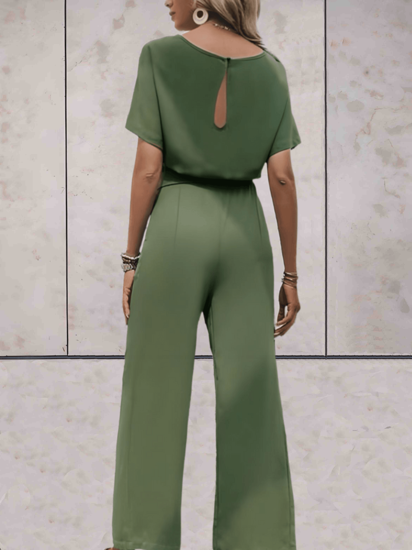 "Noa jumpsuit dames, stijlvol en comfortabel, wijde mouwen, striklinten, ademende stof, chic en veelzijdig."