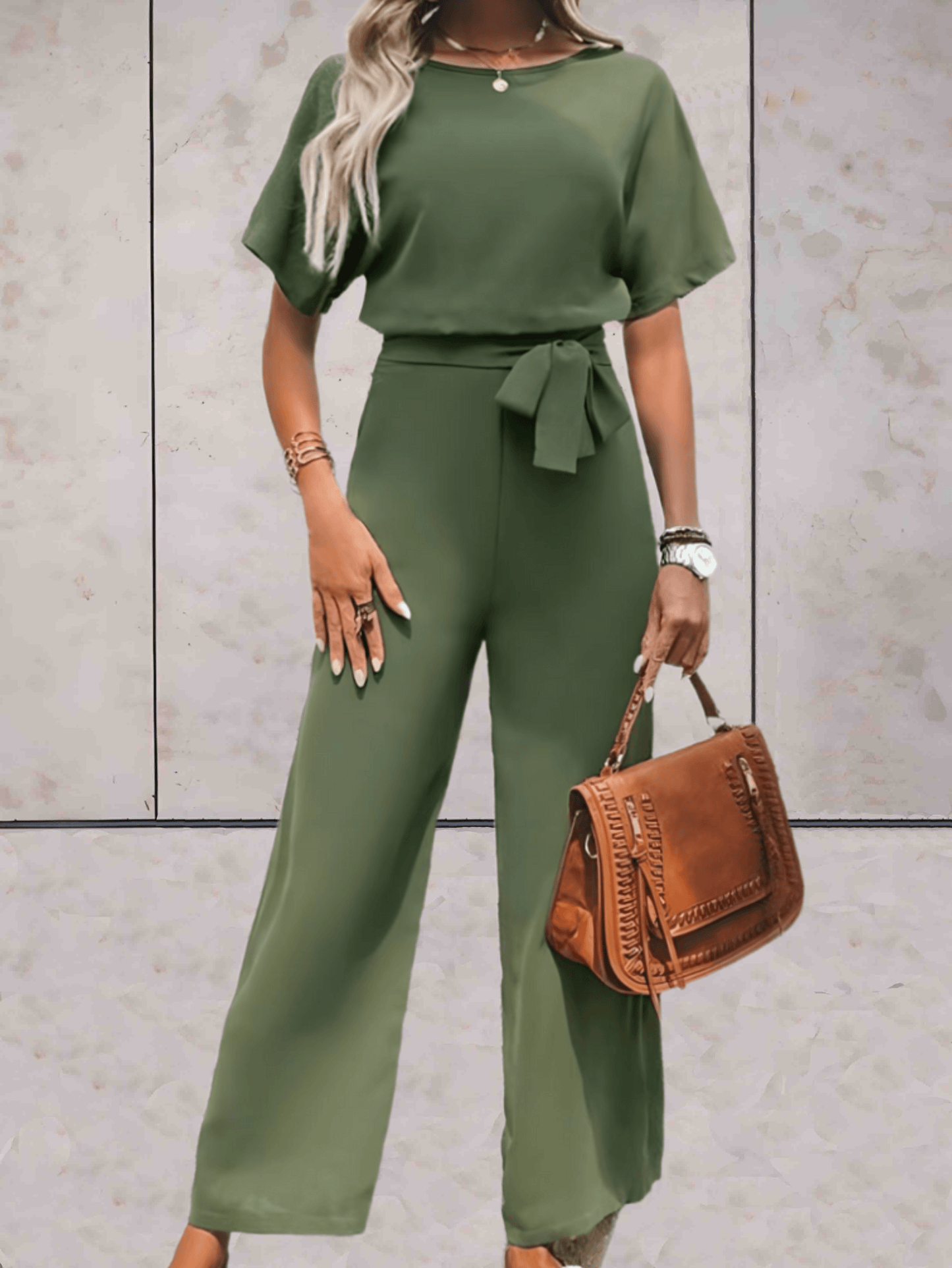"Noa jumpsuit dames, stijlvol en comfortabel, wijde mouwen, striklinten, ademende stof, chic en veelzijdig."