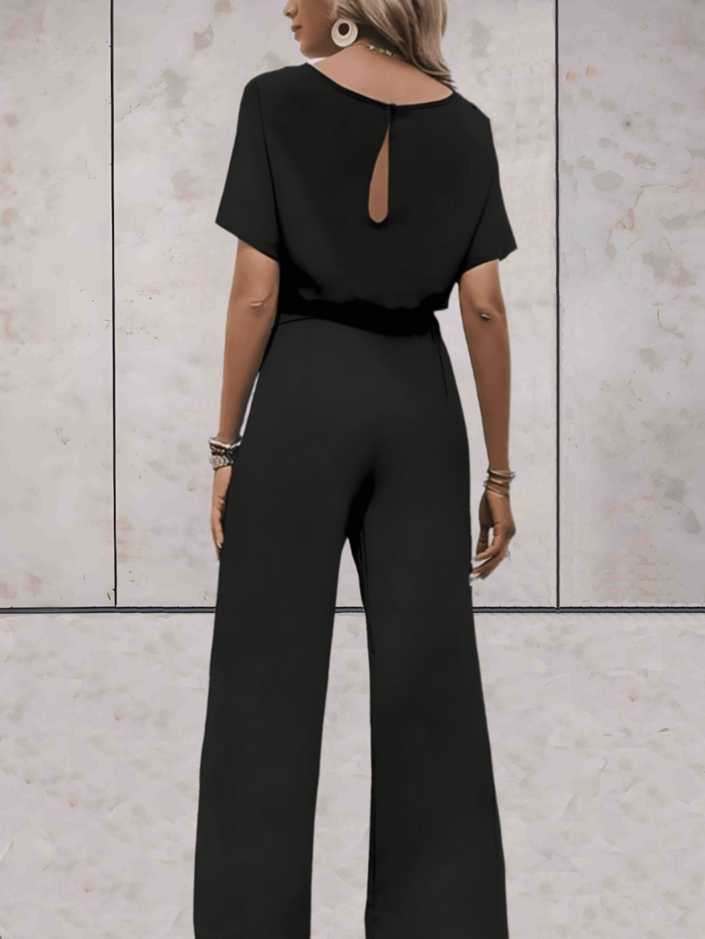 "Noa jumpsuit dames, stijlvol en comfortabel, wijde mouwen, striklinten, ademende stof, chic en veelzijdig."