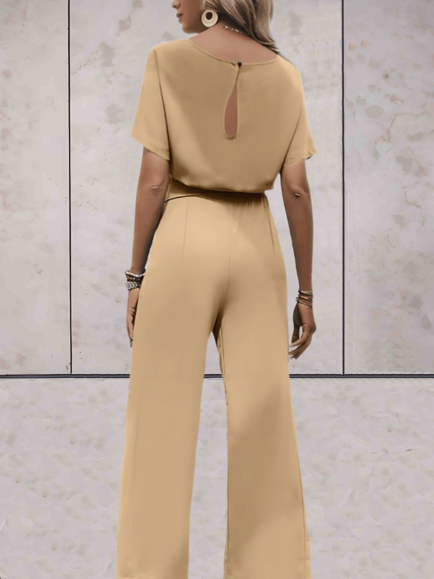 "Noa jumpsuit dames, stijlvol en comfortabel, wijde mouwen, striklinten, ademende stof, chic en veelzijdig."