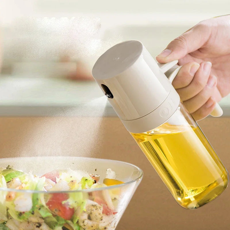 "Oliespuitfles 250 ml van hoog borosilicaatglas, slank en stijlvol ontwerp voor gelijkmatige olieverdeling in de keuken."