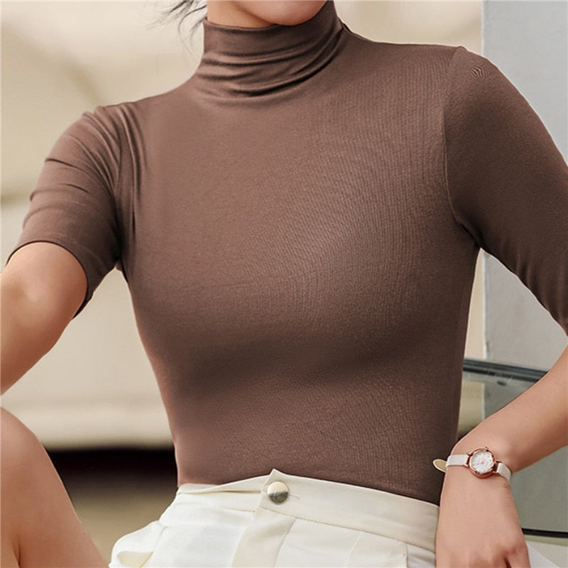 Orseline Top | Naadloze ultra-dunne coltrui dames, elegant zwart ontwerp, glad silhouet, perfecte pasvorm voor elke outfit.