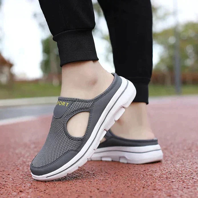 "Orthopedische herenpantoffels slip-on, ademend mesh en lichtgewicht, comfortabel voor brede voeten en dagelijks gebruik."